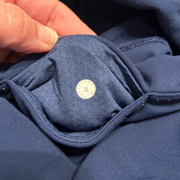 Lululemon navy leggings w/ laser cut design down sides - Picture 2 of 10